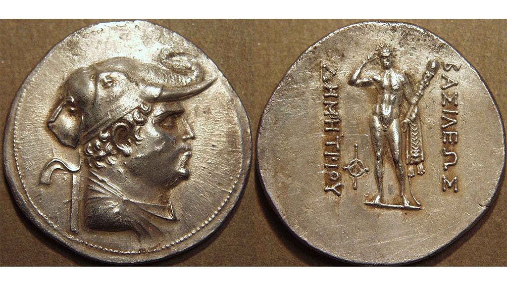 Demetrios on the front face of the coin with an elephant headdress and on the reverse is Greek deity Herakles