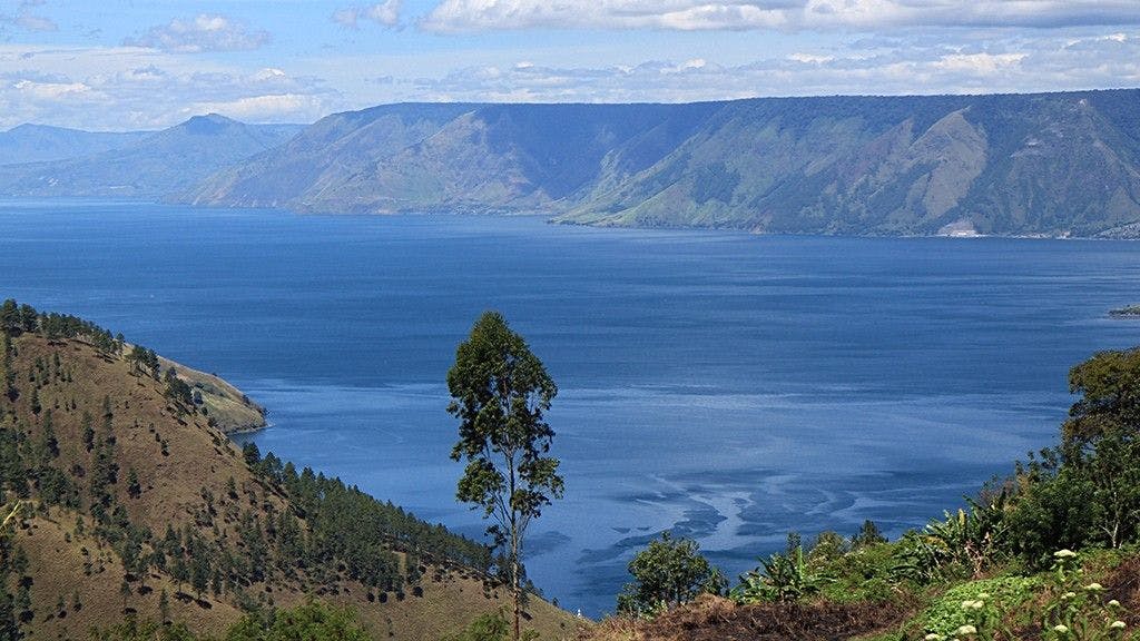 The volcano eruption at Mt. Toba created a depression where Toba Lake stands today
