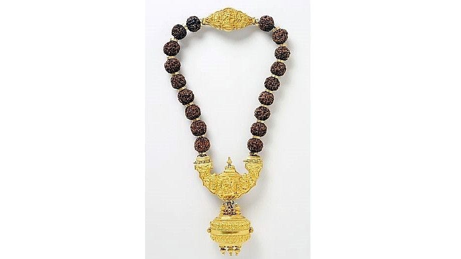 A necklace with pendant containing linga worn by Lingayats