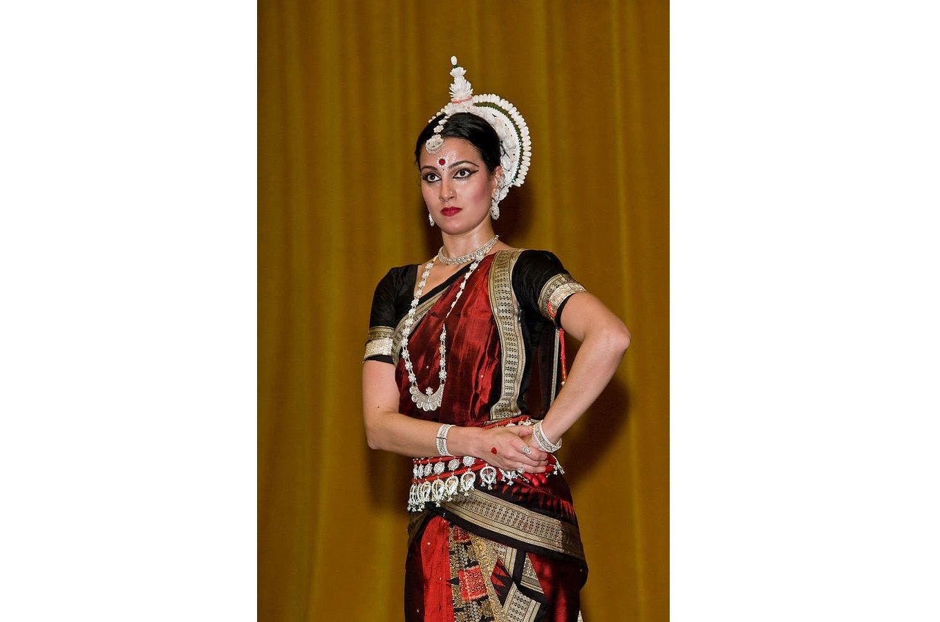 Odissi dancer with the headgear made of Sholapith 