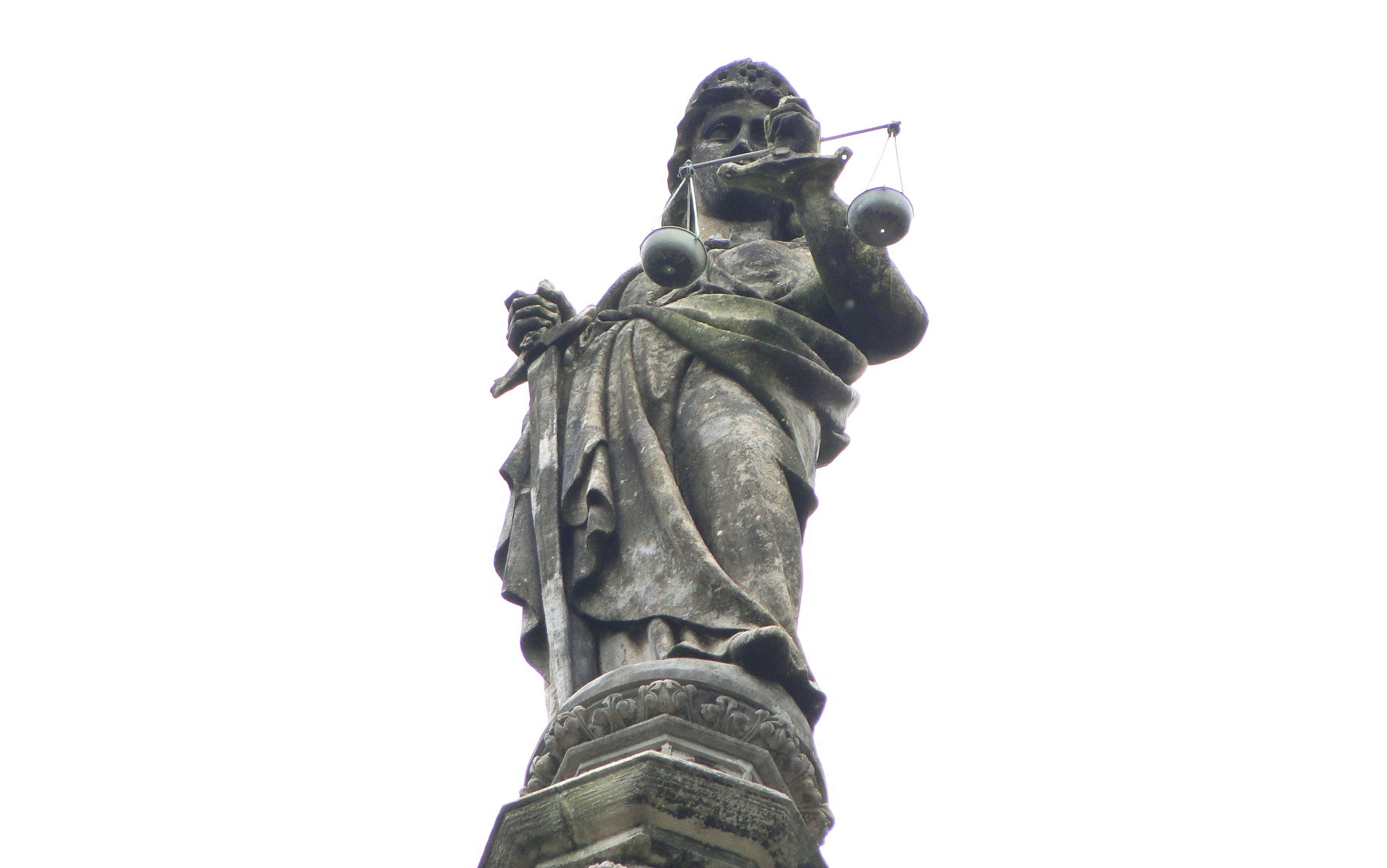 Statue of Justice atop the building
